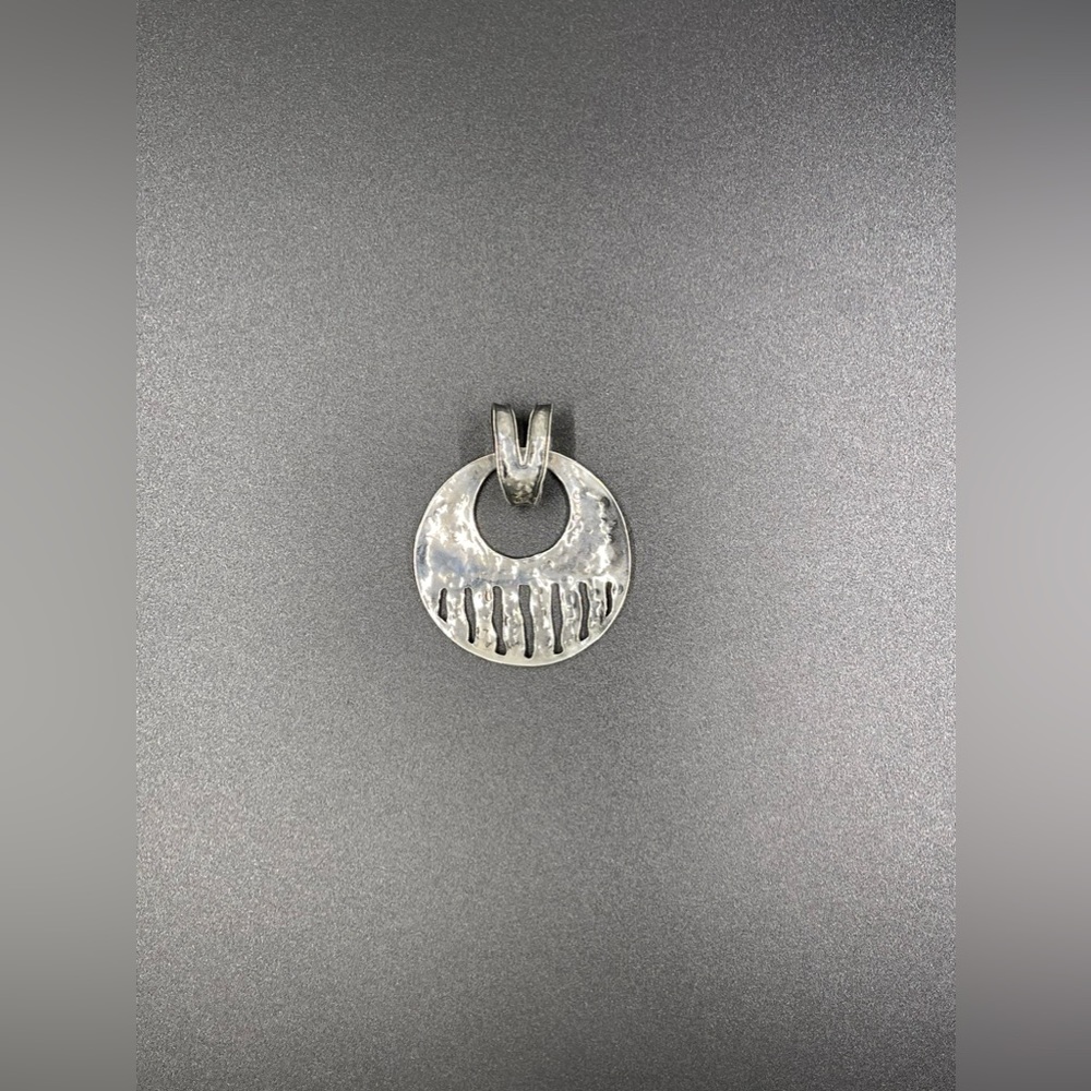 Retired Silpada Designs Cascading Wave Pendant.